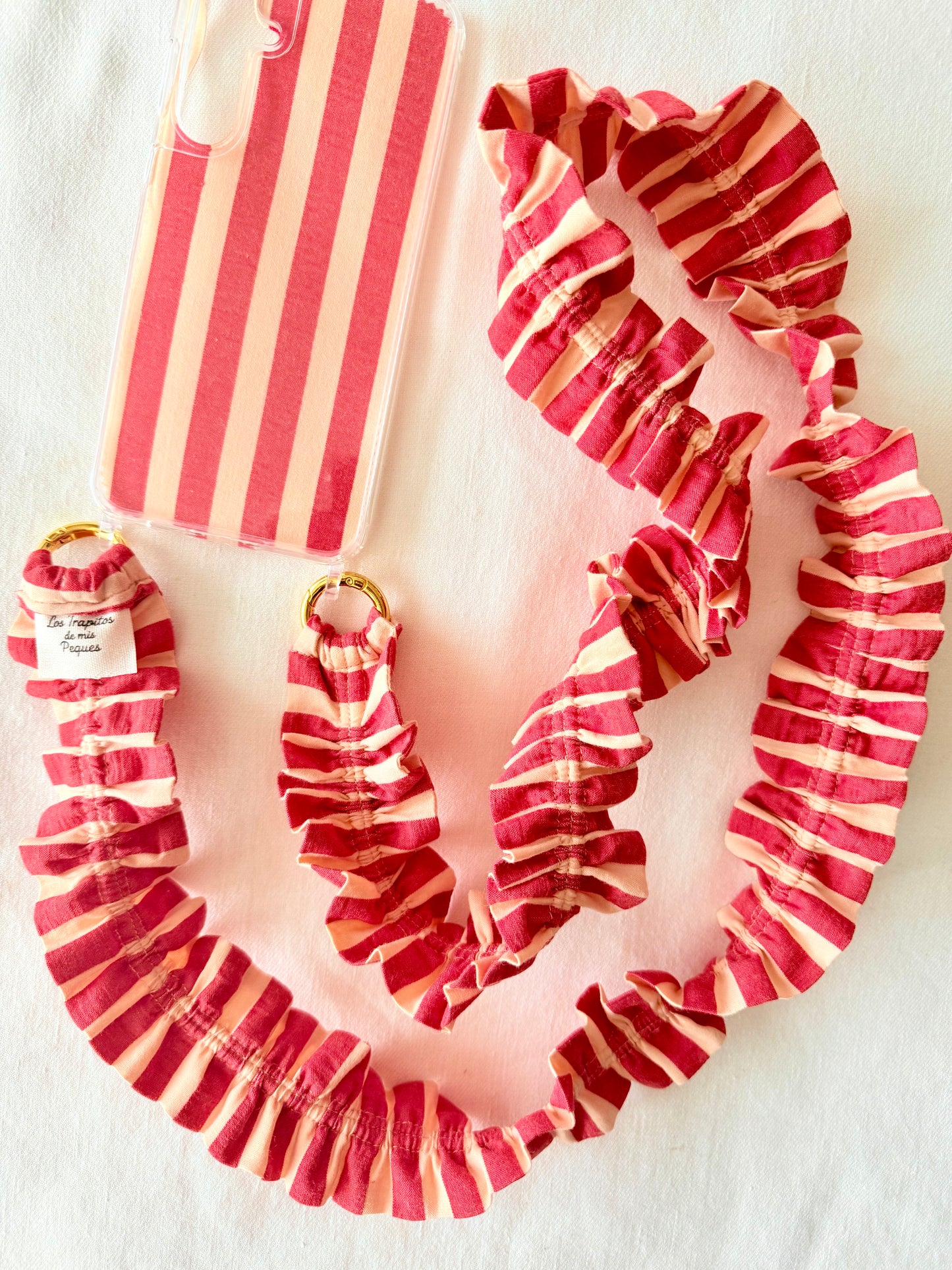 Conjunto Cuelga Movil Rayas Coral y Rojo