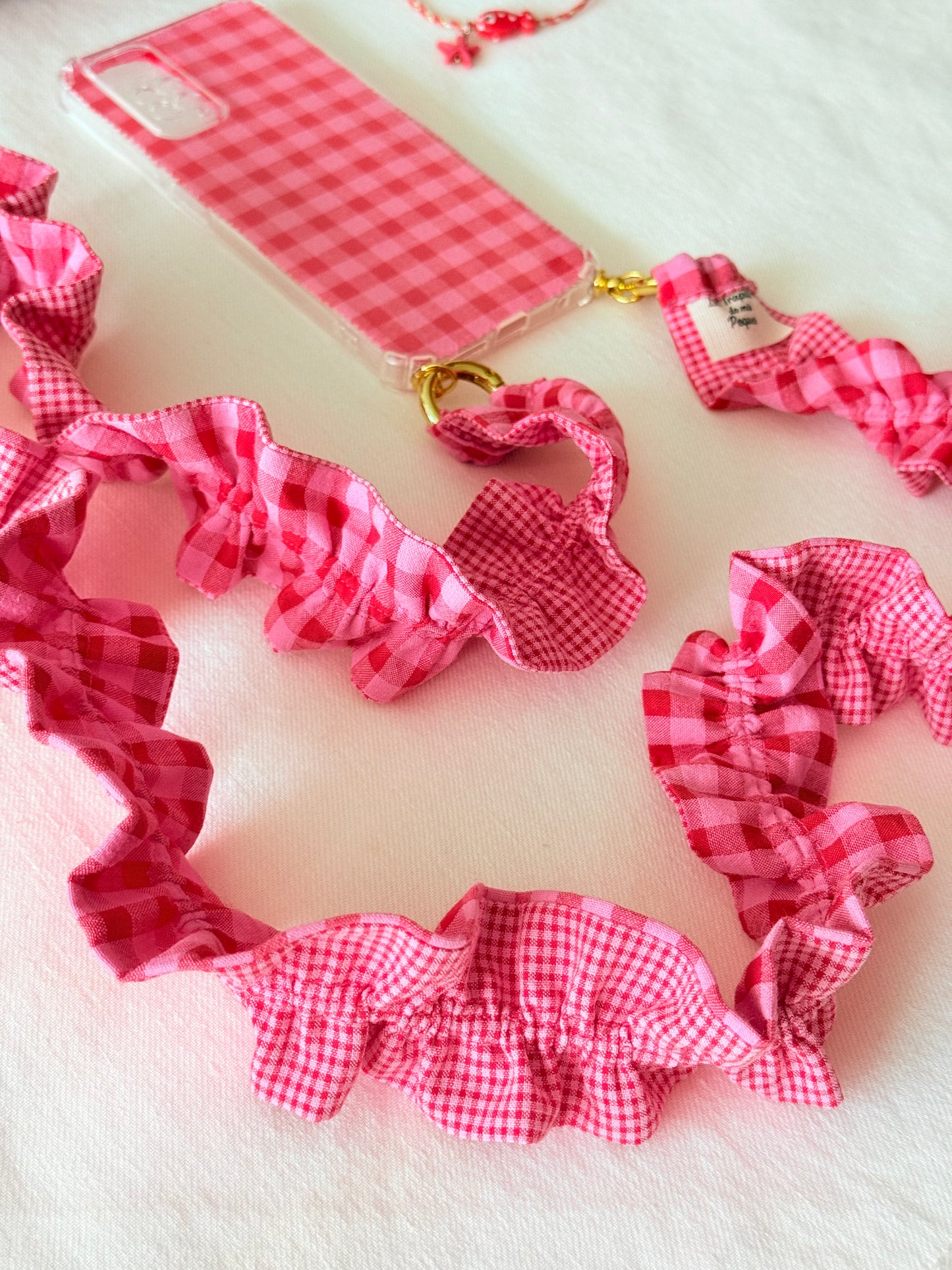 Conjunto Cuelga Movil Rizado Vichy Rojo y Rosa