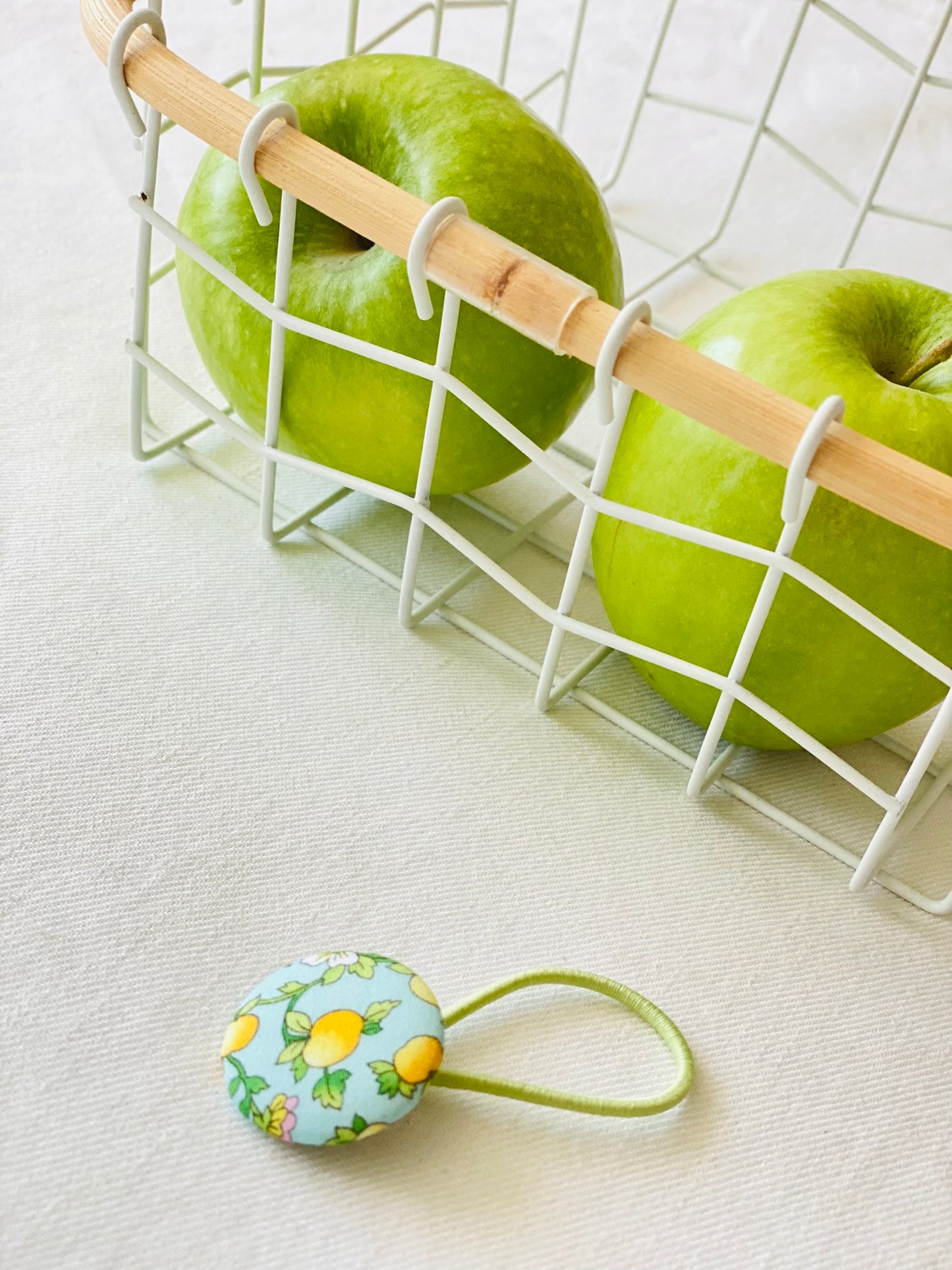 Coletero Botón Manzanas