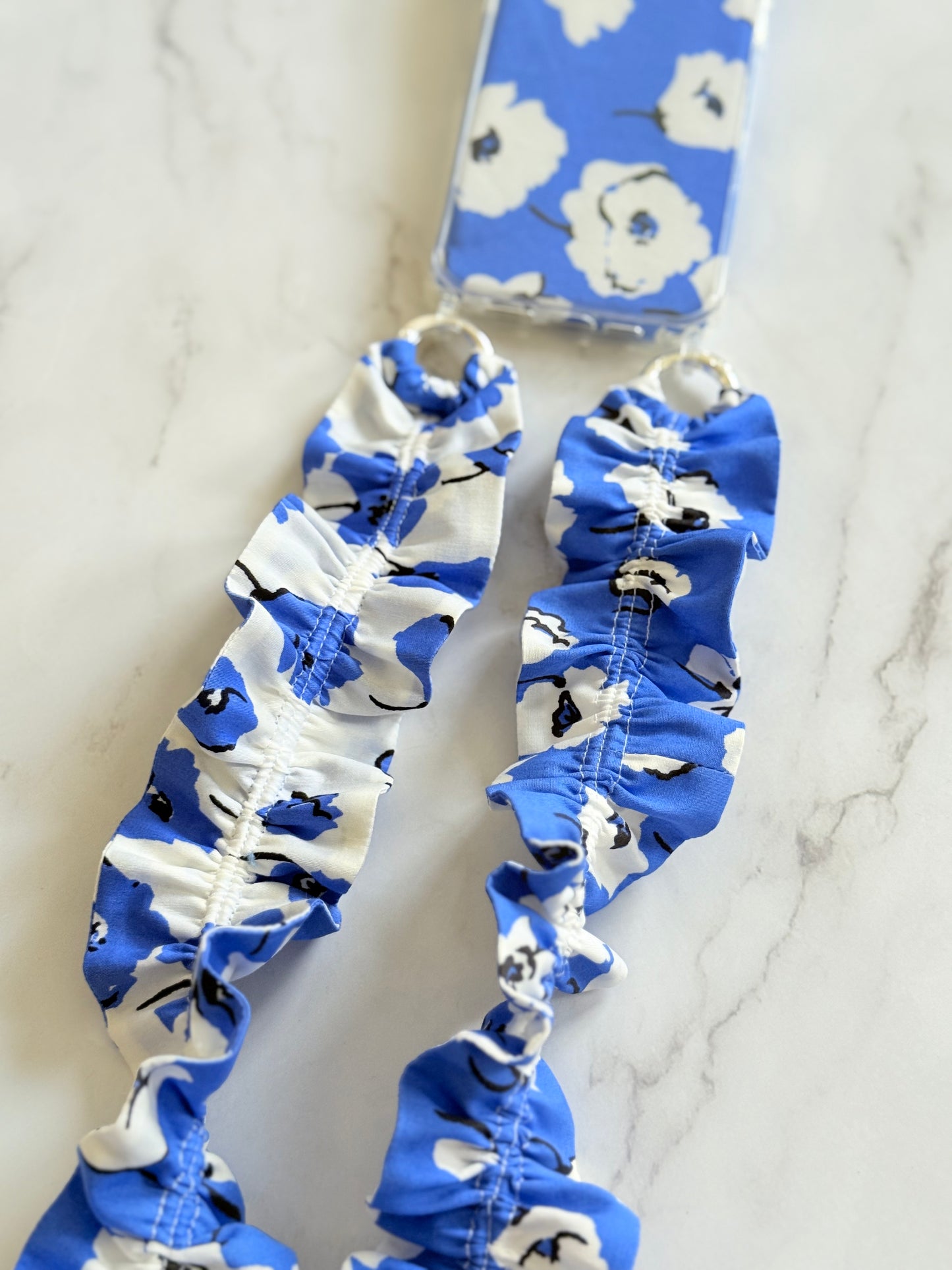 Conjunto Cuelga Movil Rizado Amapolas, funda azul